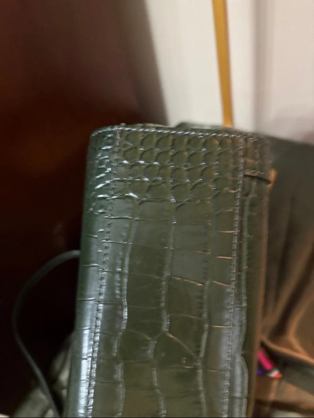 kate spade New York dark green croc-embossed leather satchel with colorful bow